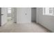 Bedroom featuring neutral carpet, closet and open doorway at 20530 E 58Th Ave, Aurora, CO 80019