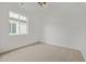 Bedroom with neutral carpeting and a large window providing great natural light at 20530 E 58Th Ave, Aurora, CO 80019