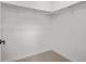 Walk-in closet with shelving, carpet and white walls at 20530 E 58Th Ave, Aurora, CO 80019