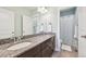 Bathroom with double sinks, granite countertops, and a separate shower, offering a clean design at 11346 E 27Th Ave, Denver, CO 80238
