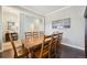 Elegant dining room featuring hardwood floors, neutral walls and space for a large gathering at 11346 E 27Th Ave, Denver, CO 80238