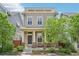 Charming two-story home with a welcoming front porch, offering a cozy and inviting curb appeal at 11346 E 27Th Ave, Denver, CO 80238