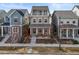 Charming two-story home with a cozy front porch and balcony, perfect for relaxing outdoors at 11346 E 27Th Ave, Denver, CO 80238