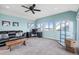 Bright living room offers ample light and views, perfect for a home office setup at 11346 E 27Th Ave, Denver, CO 80238
