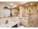 Luxurious bathroom featuring a spacious walk-in shower with tile and a modern vanity at 2650 Hawthorne Pl, Boulder, CO 80304