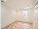 Bright bedroom with wood floors, a window letting in natural light, and closet at 2650 Hawthorne Pl, Boulder, CO 80304