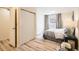 Bedroom showcasing a cozy layout, closet, and a window letting in natural light at 2650 Hawthorne Pl, Boulder, CO 80304