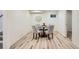 Charming dining area featuring wood floors and a round table with upholstered chairs at 2650 Hawthorne Pl, Boulder, CO 80304