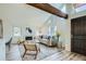 Well-lit living room with a fireplace, comfortable seating, and attractive decor, perfect for relaxation at 2650 Hawthorne Pl, Boulder, CO 80304