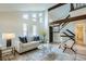 Bright living room featuring high ceilings, stylish furnishings, and ample natural light at 2650 Hawthorne Pl, Boulder, CO 80304