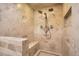 Tiled shower area featuring dual shower heads and a built-in bench at 2650 Hawthorne Pl, Boulder, CO 80304