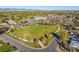 Aerial view of Discovery Park with a soccer field and colorful autumn trees in Wheat Ridge at 4024 Upham St, Wheat Ridge, CO 80033