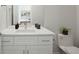 Bathroom with a modern vanity, quartz countertop and stylish faucet at 4024 Upham St, Wheat Ridge, CO 80033