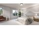 Bright and airy main bedroom with soft carpet, neutral tones, and ample natural light at 4024 Upham St, Wheat Ridge, CO 80033