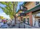 View of Wolf + Wildflower Wine Bar and sidewalk seating in the Wheat Ridge community at 4024 Upham St, Wheat Ridge, CO 80033