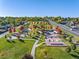 Aerial view of Discovery Park's skate park, playground, and lush green spaces in Wheat Ridge at 4024 Upham St, Wheat Ridge, CO 80033