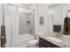 Clean bathroom, granite vanity, shower/tub combo at 7766 Fraser River Cir, Littleton, CO 80125