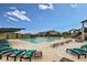 Resort-style pool with plenty of lounge chairs at 7766 Fraser River Cir, Littleton, CO 80125