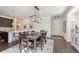 Bright dining room with hardwood floors and kitchen views at 7766 Fraser River Cir, Littleton, CO 80125