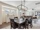 Bright dining room with large windows and hardwood floors at 7766 Fraser River Cir, Littleton, CO 80125