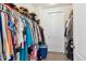 Spacious walk-in closet with ample shelving and hanging space at 7766 Fraser River Cir, Littleton, CO 80125