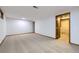 Spacious unfinished basement offers room for storage and future customization potential at 11617 W 71St Dr, Arvada, CO 80004
