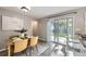 Dining area boasts natural light and a view of the backyard at 11617 W 71St Dr, Arvada, CO 80004