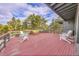 This spacious back deck features plenty of room for seating to enjoy the outdoors at 29304 Thimbleberry Ln, Evergreen, CO 80439