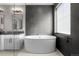 Bathroom featuring a modern soaking tub, sleek vanity, and dark tile work around a window at 6737 S White Crow Way, Aurora, CO 80016