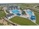 Aerial view of a community pool featuring swimming areas, lounge chairs, and well-maintained landscaping at 6737 S White Crow Way, Aurora, CO 80016