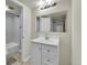 This bathroom has a large mirror with updated sink at 3432 S Locust St # A, Denver, CO 80222