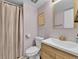 Cozy bathroom with tub/shower combo and updated sink with granite counter at 3432 S Locust St # A, Denver, CO 80222