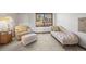 Sitting room with neutral palette, comfortable seating and large window at 8223 Kincross Way, Boulder, CO 80301