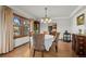Inviting dining room with hardwood floors, natural light, and seating for four at 8223 Kincross Way, Boulder, CO 80301