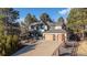 Charming two-story home with a three-car garage, landscaped front yard and inviting curb appeal at 8223 Kincross Way, Boulder, CO 80301