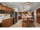 Traditional eat-in kitchen with custom oak cabinetry and stainless steel appliances at 8223 Kincross Way, Boulder, CO 80301