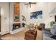 Bright and spacious living room with fireplace, hardwood floors, and vaulted ceilings at 8223 Kincross Way, Boulder, CO 80301