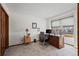 Bright office space with a large desk, natural light, and neutral decor at 8223 Kincross Way, Boulder, CO 80301