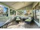 Enclosed patio with comfortable lounge chairs and natural light at 8223 Kincross Way, Boulder, CO 80301