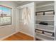 Well-organized walk-in closet with built-in shelving and ample storage space, perfect for all your wardrobe needs at 880 E 16Th Ave # D, Denver, CO 80218