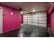 Spacious garage with an automatic door and a dark floor, perfect for storage and vehicle parking at 880 E 16Th Ave # D, Denver, CO 80218