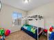 Bedroom featuring a bunk bed and a window with blinds at 3155 Kedleston Ave, Highlands Ranch, CO 80126