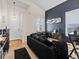 Bright living room with modern furniture, high ceiling and lots of light at 3155 Kedleston Ave, Highlands Ranch, CO 80126
