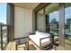 Outdoor balcony featuring comfortable seating and views of the city skyline at 1750 Wewatta St # 834, Denver, CO 80202