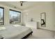 Bedroom featuring city views, natural light, and a minimalist design with a spacious layout at 1750 Wewatta St # 834, Denver, CO 80202