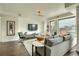 Inviting living room featuring cozy seating, modern decor, and beautiful views of the cityscape at 1750 Wewatta St # 834, Denver, CO 80202