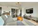 View of the living room, featuring contemporary furnishings, decor, and a work space at 1750 Wewatta St # 834, Denver, CO 80202