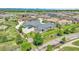 Beautiful aerial view of a home with lush landscaping and mountain views at 12444 Madison Way, Thornton, CO 80241