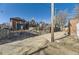 Backyard with a construction project underway with other homes visible in the background at 2631 W 34Th Ave, Denver, CO 80211
