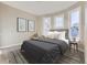 Comfortable bedroom with carpeted floors, natural light, and neutral paint colors at 2631 W 34Th Ave, Denver, CO 80211